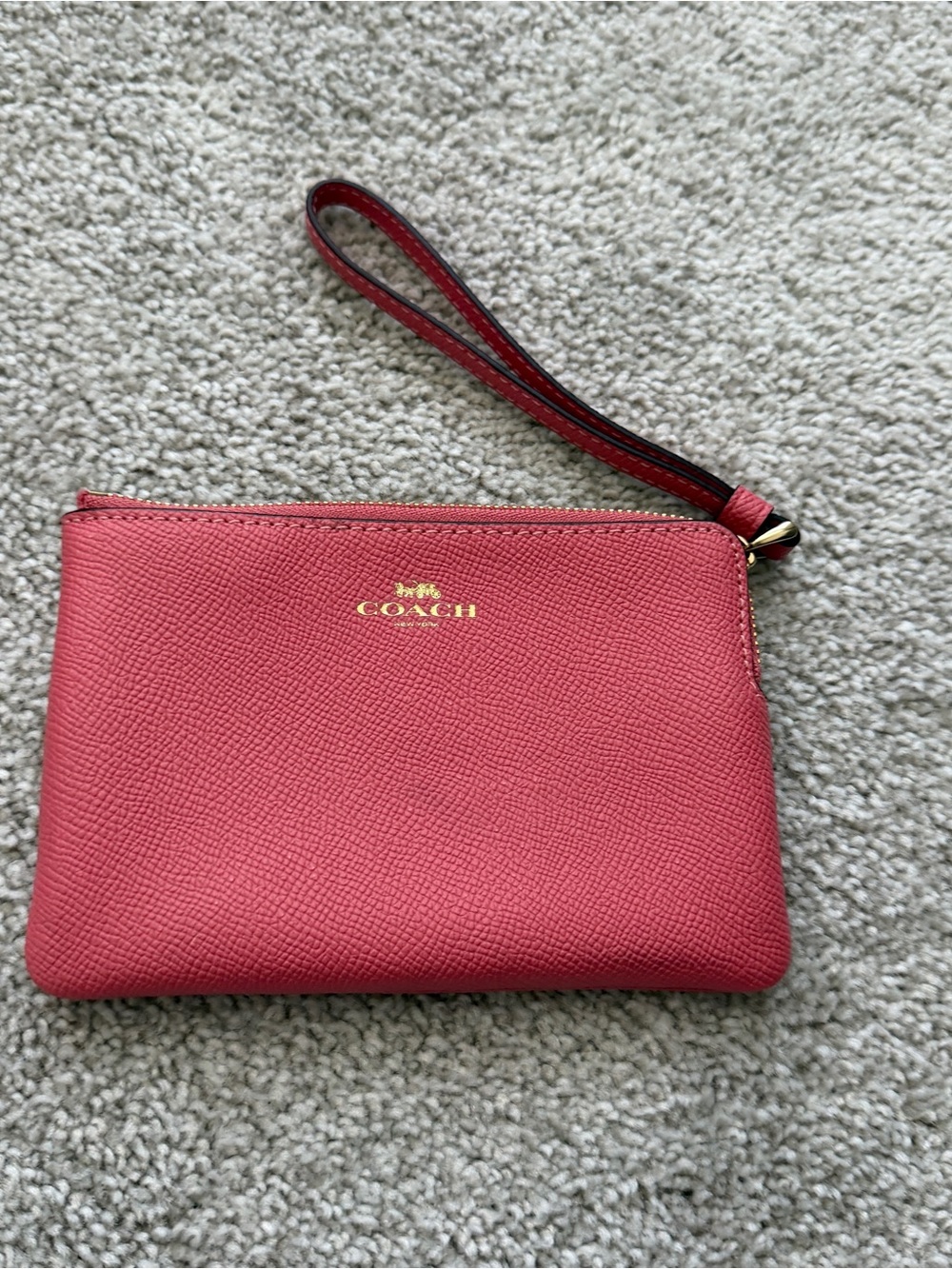 Coach Coral Pink Leather Wristlet with Gold Logo